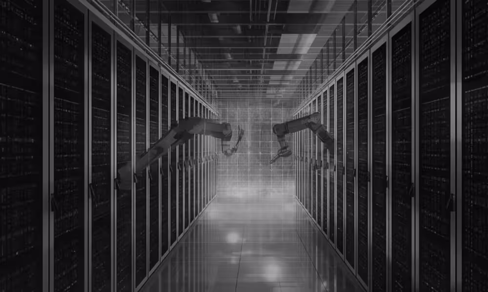 Row of server racks with robotic arms sticking out into the corridor